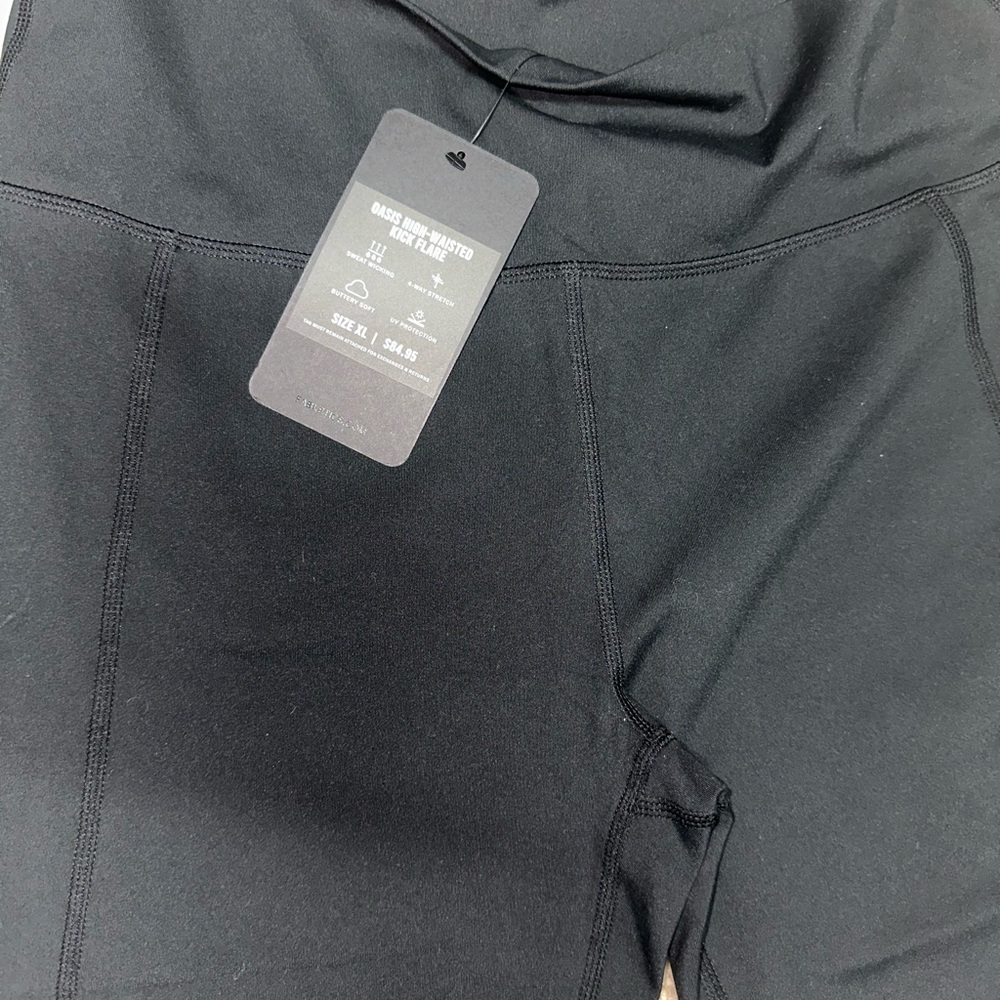 Fabletics oasis flare black leggings NWT